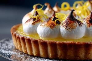 Lemon tart with toasted meringue and zest photo