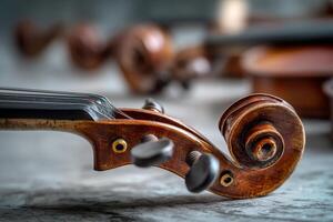 Classical violins lying on textured stone ground photo