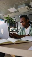 African American student using laptop to study for exam video