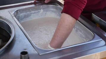 Making fresh dough at a local bakery during morning hours video