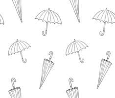 Seamless pattern of hand drawn doodle umbrellas isolated on white background vector