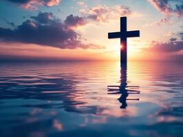 Large cross is floating in the ocean at sunset photo
