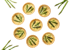 Delicious quiche tarts filled with creamy goodness and topped with fresh asparagus create delightful culinary experience png