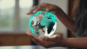 Woman gently holding a glowing digital globe with illuminated network lines, symbolizing global connection, technology, communication and the future of worldwide digital infrastructure video