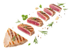 Seared tuna steak sliced with herbs and spices arranged in row showing fresh pink interior and grilled marks for delicious meal png