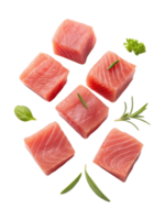Fresh tuna cubes with herbs arranged on transparency background creating vibrant and appetizing seafood presentation with touch of green png