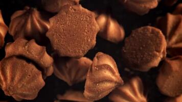 The cookies fly up and fall down. Filmed on a high-speed camera at 1000 fps. High quality FullHD footage video