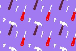 Seamless pattern with screwdrivers and hammers on purple background vector