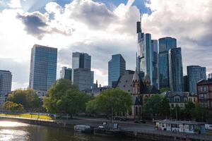 Frankfurt Skyline with Main Tower and Historic Architecture photo