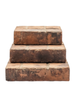 A set of three weathered, rectangular bricks stacked in a step-like arrangement. the weathered bricks showcase the character and history of the construction material. png