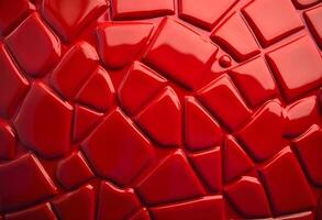 Close-up of glossy red mosaic with irregular tiles and reflective textured surface photo