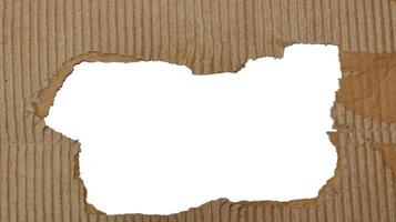Torn Brown paper box texture or cardboard with torn for design background photo