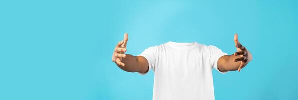 Individual without head extend arms in a welcoming gesture against a bright blue backdrop. This collage emphasizes lifestyle aspects and the concept of isolation, making a bold statement. photo