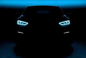 Illuminated Elegance The Front View of a Modern Car photo
