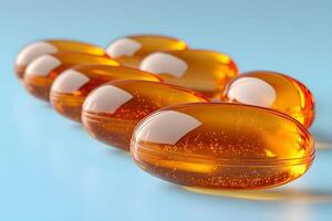 Close-up of Shiny Omega-3 Capsules on Blue Background for Health and Wellness Concepts photo