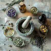 Mortar and pestle grinding herbs with various dried herbs and bottles on rustic table photo