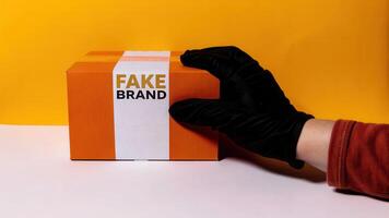 Illegal pack of sealed boxes with fake logos studio setting closeup perspective highlighting counterfeit issues photo