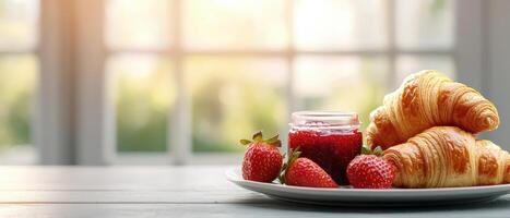 Delicious croissants and fresh strawberries breakfast table food photography cozy kitchen close-up view photo