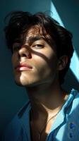 Portrait of a young man in natural light indoor setting artistic expression modern environment close-up view photo