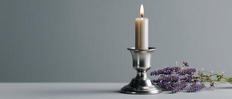 Serene candle lighting with lavender bouquet indoor still life minimalist calm ambiance photo