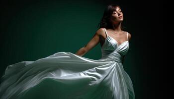 Elegant fashion photography of a model in a flowing white dress studio portrait dramatic lighting photo