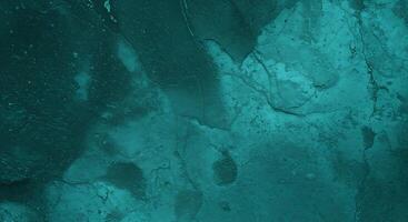 Textured Teal Surface with Cracks and Subtle Variations in Tone. photo