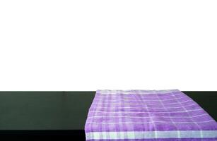 purple cloth fabric on black table photo