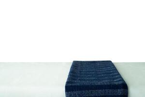 blue cloth on white table photo