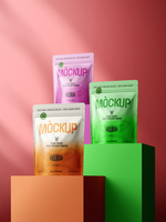 Variety of colorful matte standing pouches mockup on geometric podium with vibrant background for product display psd