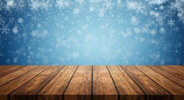 Wooden table with snowflakes on blue background photo