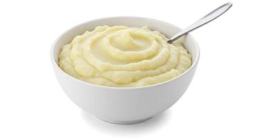 A bowl of mashed potatoes with a spoon photo