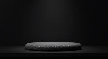 A black stone table sitting on a black surface photo