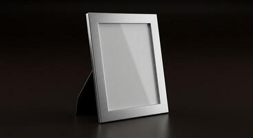 A blank white photo frame on a black surface