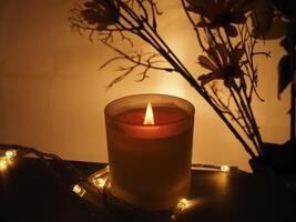 Candles in the dark at night about Moody style visual magic. photo