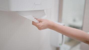 A close-up shot capturing the pristine simplicity of a bathroom scene, showcasing the essential elements with a focus on functionality and understated design. video