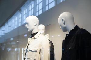 Mannequins in a window display photo