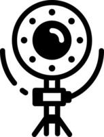 A glyph style icon showing a ring light vector