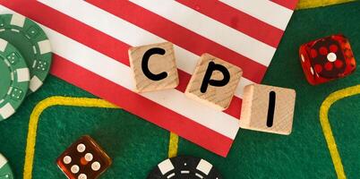 CPI, consumer price index concept. Wooden block with the words CPI . Goods price inflation and inflation rising. Impact on economic growth with relate. photo