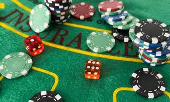 Casino concept. Dice game on bokeh background. photo
