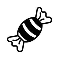Wrapped candy icon designed in glyph style. vector