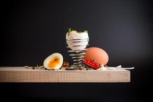 delicacy with red caviar and boiled egg for breakfast, isolated on black background.Dietary simple breakfast. photo