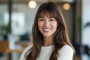 Portrait of a smiling woman in a bright and stylish environment photo