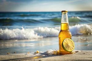 A cold beer with a lime on a sandy beach by the waves. photo