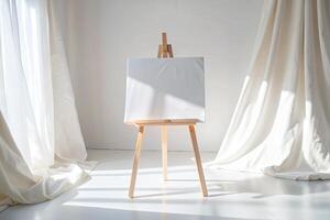 Blank canvas on an easel in a sunlit room with draped curtains. photo