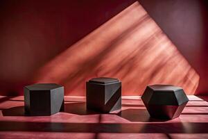 Geometric black shapes casting shadows on a red backdrop. photo