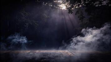 Dramatic foggy landscape with rays of light piercing through. photo