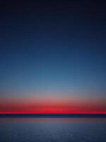 Peaceful horizon with a gradient of colors at sunset. photo