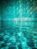 Crystal clear water reflects light in a tranquil pool. photo