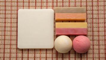 Minimalist Bathroom Arrangement with Towels, Soap, and Bath Bombs photo
