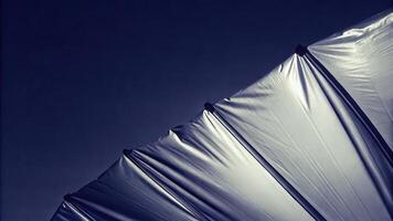 Wrinkled Blue Fabric with Soft Lighting photo